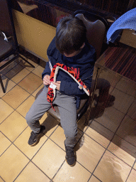 Max with a toy snake in the The Best restaurant