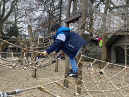 Max on a rope bridge at the playground in front of the Savanne restaurant at the Antwerp Zoo