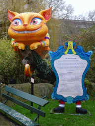 Decoration `The Cheshire Cat` of the Alice in Wonderland Light Festival at the Antwerp Zoo, with explanation