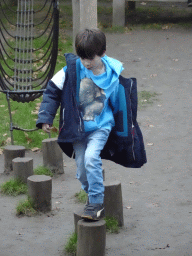 Max on stepping stones at the Lion`s Path playground at the Antwerp Zoo