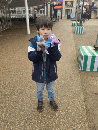 Max with stuffed animals in front of the souvenir shop at the Antwerp Zoo