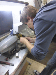 Man polishing a diamond ring in the workshop of the Gela diamond shop at the Pelikaanstraat street