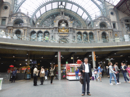 Miaomiao`s father at the platform hall of the Antwerp Central Railway Station