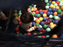 Max playing in the ball pit at the Ocean World at the Aquatopia aquarium