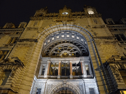 Facade of the west side of the Antwerpen-Centraal railway station at the Pelikaanstraat street, by night