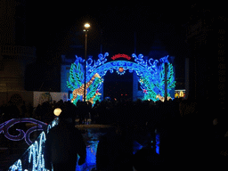 China Light Giraffe and Zebra statues at the entrance to the Antwerp Zoo at the Koningin Astridplein square, by night