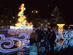 Tim, Miaomiao, Max and friends at the China Light Dragon statue and christmas tree at the Koningin Astridplein square, by night