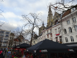 Restaurants at the Groenplaats square, and the tower of the Cathedral of Our Lady