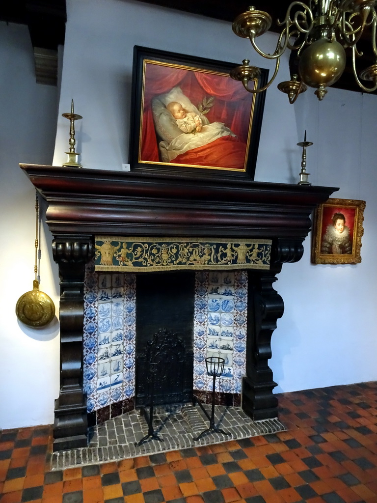 Hearth, the painting `Young boy on his death bed` by Matthijs van den Bergh and the portrait of Elisabeth of France, later Isabelle, Queen of Spain, by Frans Pourbus II at the First Floor of the Rubens House