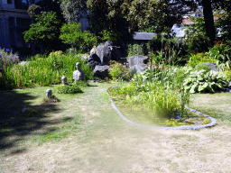 Statues and plants at the Den Botaniek botanical garden