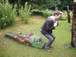 Tim with a wooden crocodile in the Natuurpark Berg & Bos park