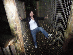 Miaomiao in a hang bridge in the Apenheul zoo