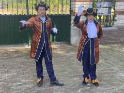 People dressed as royal servants at the road from the Stallenplein square to the Palace Garden at Het Loo Palace, during the Princes and Princesses Day