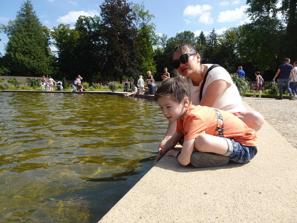 Miaomiao and Max with a Carp in the pond with the fountain at the north side of the Palace Garden of Het Loo Palace