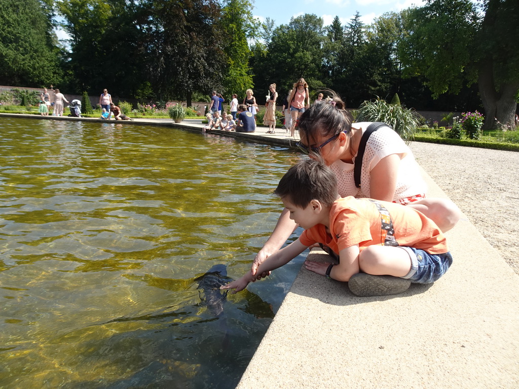 Miaomiao and Max with a Carp in the pond with the fountain at the north side of the Palace Garden of Het Loo Palace