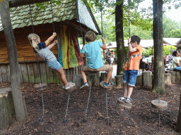 Max on a rope bridge at the Huis van NAAAP playground at the Apenheul zoo