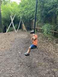 Max on a zip line at the Huis van NAAAP playground at the Apenheul zoo
