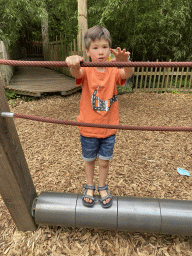 Max on a balancing pole at the Waaghals playground at the Apenheul zoo