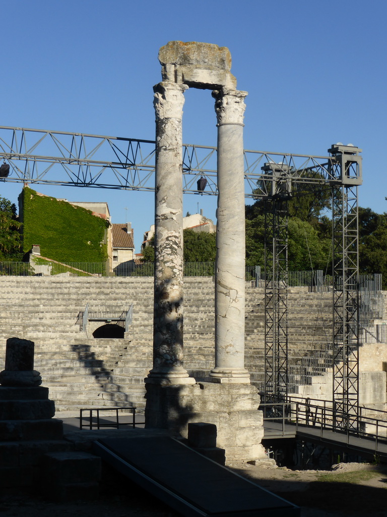 Columns and seats of the Ancient Theatre of Arles, viewed from the Rue du Cloître street