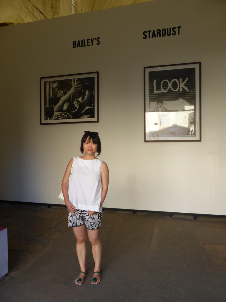 Miaomiao with two posters at the Église Sainte-Anne d`Arles church