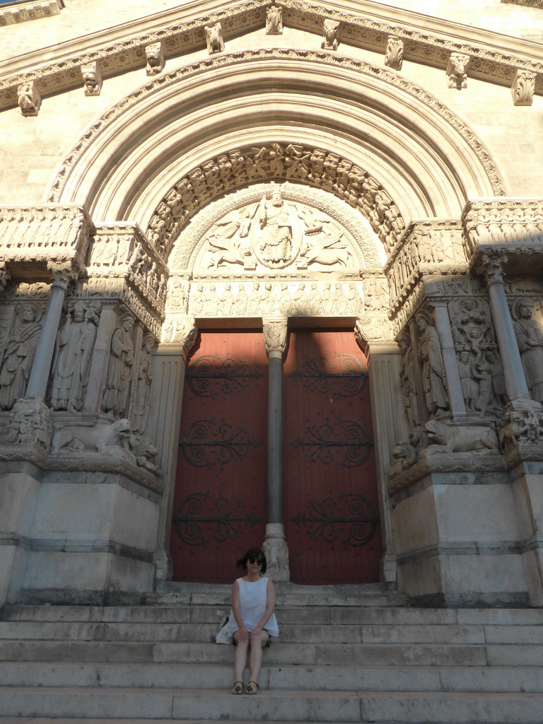 Miaomiao in front of the Church of St. Trophime at the Place de la République square