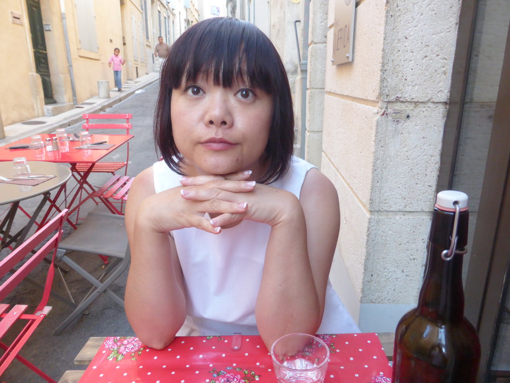 Miaomiao at the Resto Querida restaurant at the Rue des Arènes street