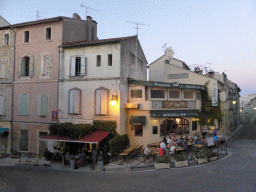Restaurants at the Rond-point des Arènes street, viewed from the northeast side of the Arles Amphitheatre