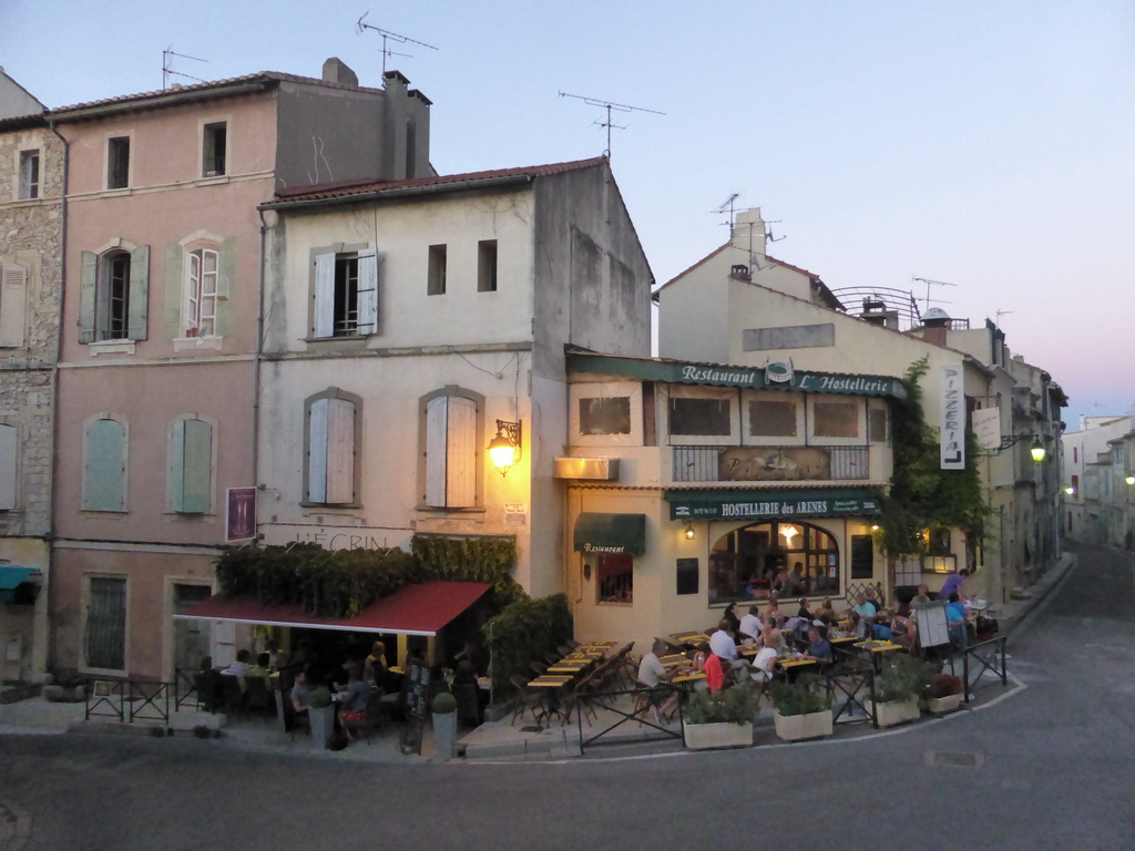 Restaurants at the Rond-point des Arènes street, viewed from the northeast side of the Arles Amphitheatre