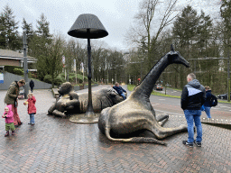 Gorilla, Rhinoceros and Giraffe statues at the entrance to Burgers` Zoo at the Antoon van Hooffplein square