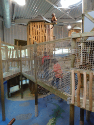 Max on a rope bridge at the Kids Jungle playground at the Park Area of Burgers` Zoo