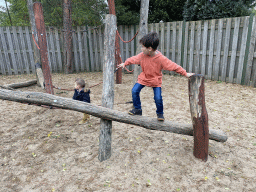 Max on a pole bridge at the playground inbetween the Bush Hall and the Desert Hall of Burgers` Zoo