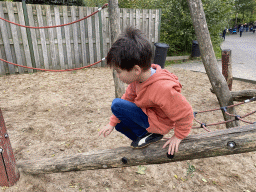 Max on a pole bridge at the playground inbetween the Bush Hall and the Desert Hall of Burgers` Zoo