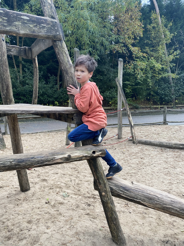 Max at the playground inbetween the Bush Hall and the Desert Hall of Burgers` Zoo