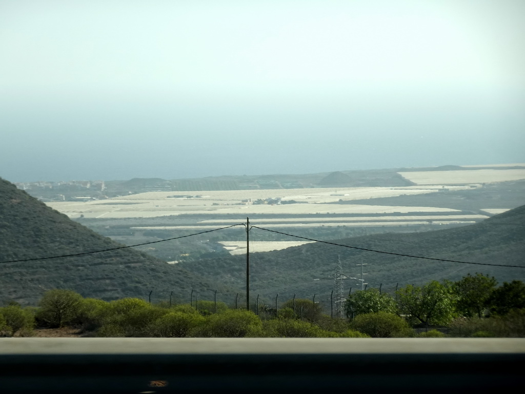 Greenhouses in te area of the town of Las Rosas, viewed from the rental car on the TF-28 road