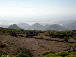 Mountains, hills and greenhouses on the south side of the island, viewed from a parking place next to the Calle Camino-Real street