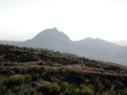 The Roque de Jama mountain, viewed from a parking place next to the Calle Camino-Real street just southwest of the town of La Escalona