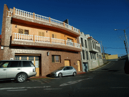 Building at the crossing of the TF-51 road and the Calle Camino-Real street at the town of La Escalona, viewed from the rental car