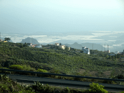 Mountains, hills and greenhouses on the south side of the island, viewed from the rental car on the TF-51 road just southwest of the town of La Escalona