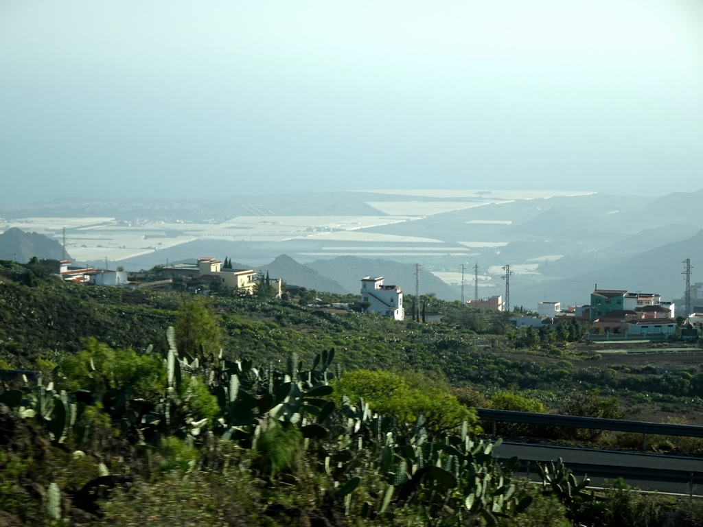 Mountains, hills and greenhouses on the south side of the island, viewed from the rental car on the TF-51 road just southwest of the town of La Escalona