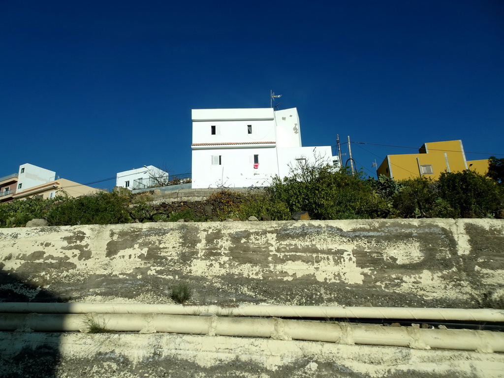 Houses along the Calle Vento street at the northwest side of town, viewed from the rental car