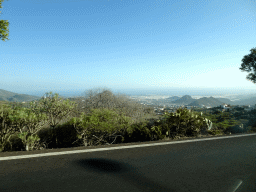 Mountains, hills and greenhouses on the south side of the island, viewed from the rental car on the TF-51 at the south side of town