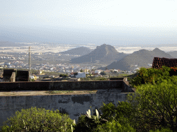 Mountains, hills and greenhouses on the south side of the island, viewed from a parking lot along the TF-51 at the south side of town