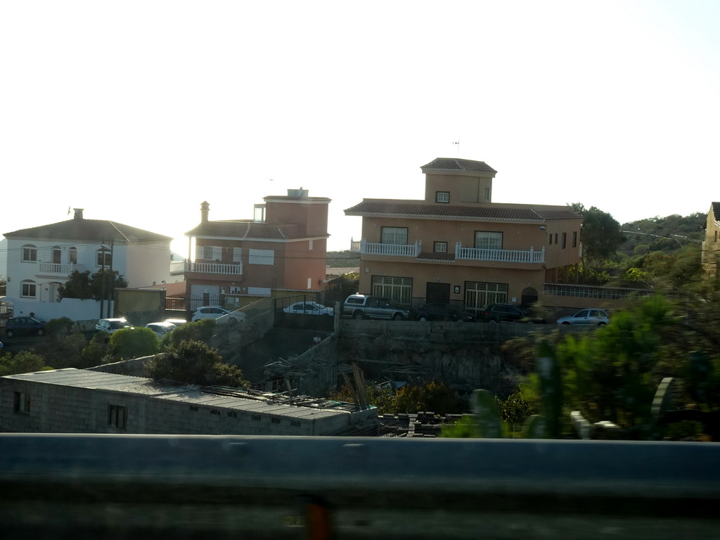 Houses at the north side of the town of La Camella, viewed from the rental car on the TF-51 road