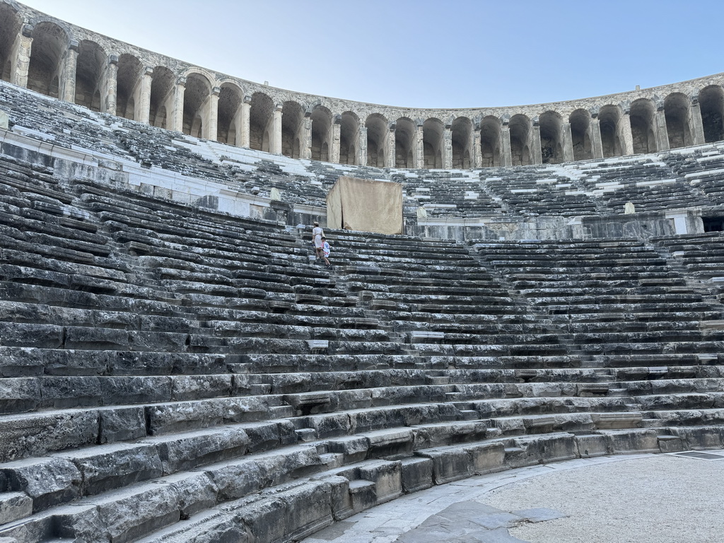 Miaomiao and Max at the west auditorium of the Roman Theatre of Aspendos, viewed from the orchestra