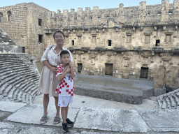 Miaomiao and Max at the diazoma of the west auditorium of the Roman Theatre of Aspendos, with a view on the orchestra, stage and stage building