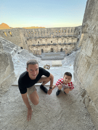 Tim and Max at the top of the west auditorium of the Roman Theatre of Aspendos, with a view on the auditorium, orchestra, stage and stage building