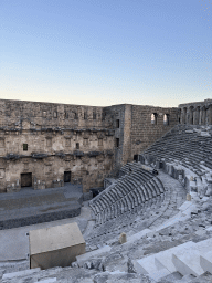 Tim and Max climbing down the south auditorium of the Roman Theatre of Aspendos, viewed from the top of the west auditorium