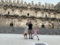 Tim, Miaomiao and Max at the orchestra in front of the stage building of the Roman Theatre of Aspendos