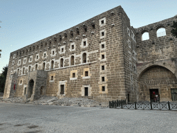 East side with entrance under the north auditorium of the Roman Theatre of Aspendos, viewed from the parking lot