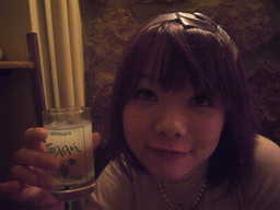 Miaomiao with a glass of Ouzo, at dinner in a restaurant in the Plaka district